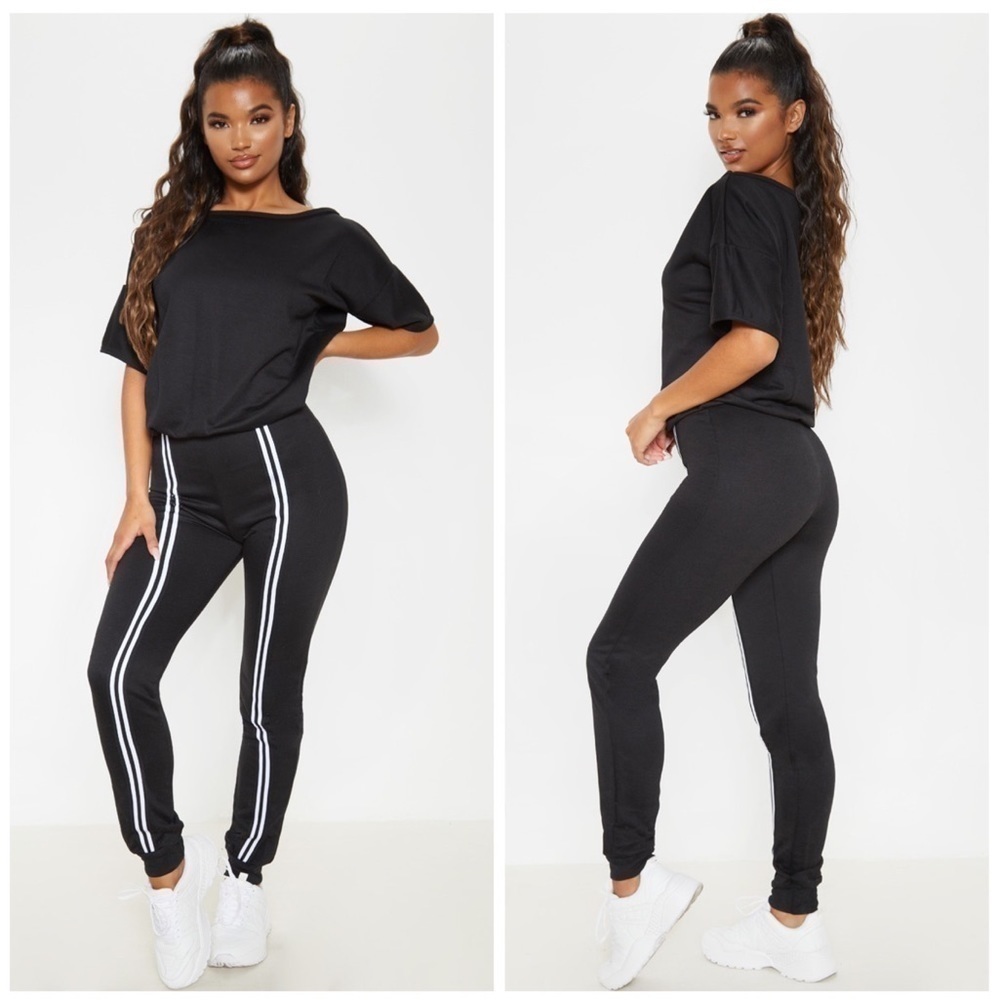 PRETTYLITTLETHING Black Loop Back Sports Striped Jumpsuit